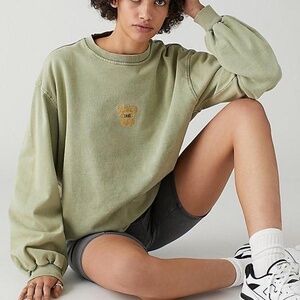 urban outfitters colorado springs sweatshirt in a washed green color